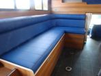 Image showing the seating in a 12 ton HGV Thorpe Olympian build. Roll top backs, double stitch detailing and finished in blue faux leather to customer's colour scheme. 